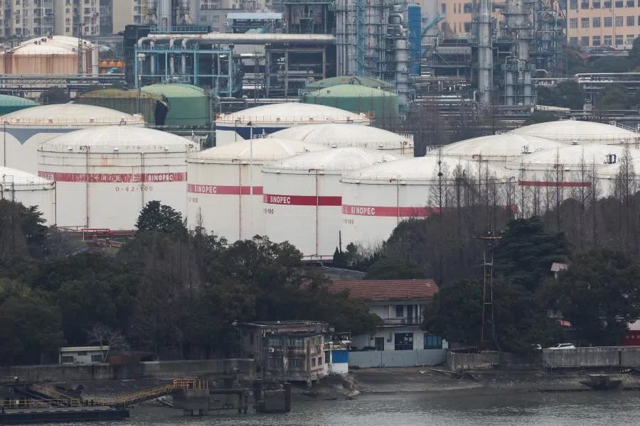 Oil storage tanks and facilities of a Sinopec plant in Shanghai, China, on 26 March 2026. (Go Nakamura/Reuters)