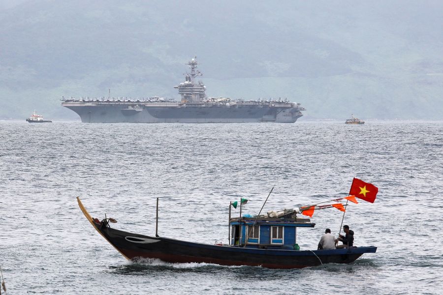 The USS Theodore Roosevelt (CVN-71) is seen while entering the port in Da Nang, Vietnam, on 5 March 2020. (Kham/Reuters)