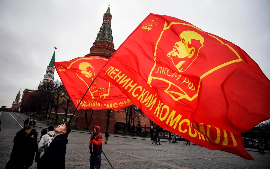 Russian Communist party supporters prepare to lay flowers at the tomb of late Soviet leader Joseph Stalin during a memorial ceremony to mark the 67th anniversary of his death at Red Square in Moscow on 5 March 2020. (Alexander Nemenov/AFP)