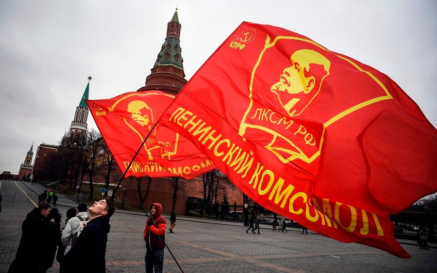 Russian Communist party supporters prepare to lay flowers at the tomb of late Soviet leader Joseph Stalin during a memorial ceremony to mark the 67th anniversary of his death at Red Square in Moscow on 5 March 2020. (Alexander Nemenov/AFP)