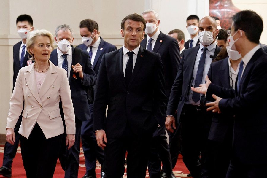 French President Emmanuel Macron and European Commission President Ursula von der Leyen arrive for a working session with the Chinese president in Beijing, China, 6 April 2023. (Ludovic Marin/Pool via Reuters)
