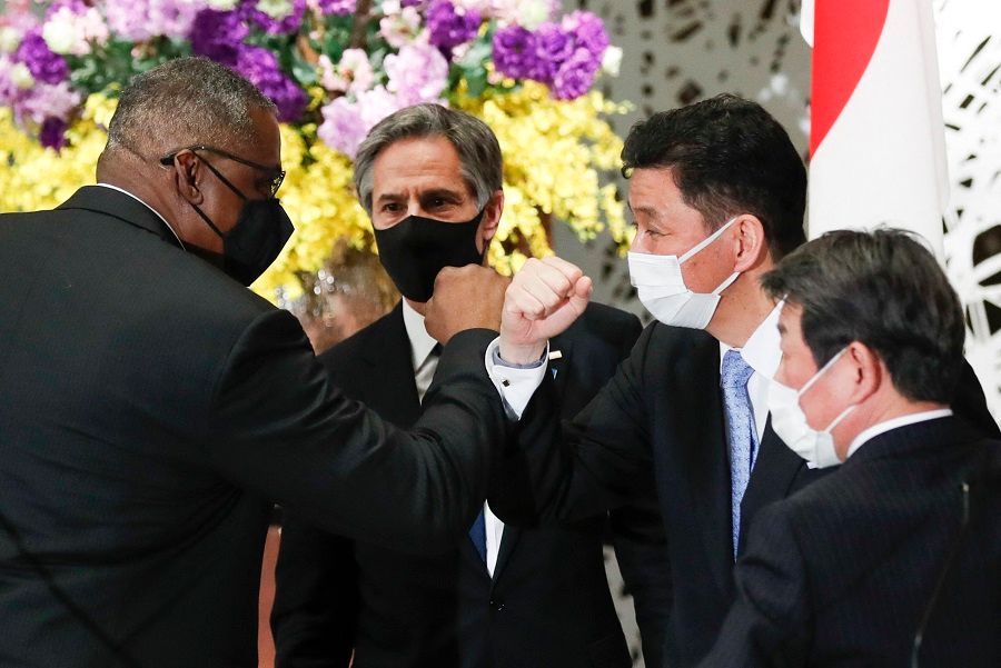 US Secretary of State Antony Blinken and Defence Secretary Lloyd Austin leave after their joint press conference with Japan's Foreign Minister Toshimitsu Motegi and Defence Minister Nobuo Kishi after their 2+2 meeting at Iikura Guest House in Tokyo, Japan, on 16 March 2021. (Kim Kyung-Hoon/Pool/AFP)