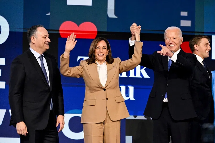 From left, US Second Gentleman Doug Emhoff, US Vice-President Kamala Harris, and US President Joe Biden during the Democratic National Convention at the United Center in Chicago, Illinois, US, on 19 August 2024. (Victor J. Blue/Bloomberg)