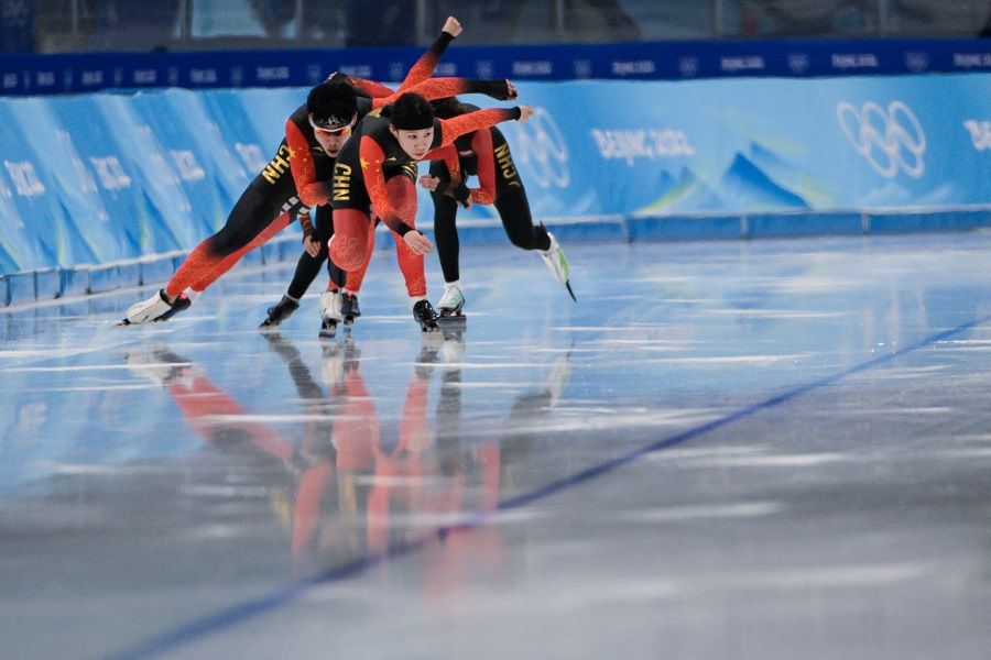 Chinese athletes take part in a training session at the National Speed Skating Oval in Beijing, China, on 1 February 2022, ahead of the Beijing 2022 Winter Olympic Games. (Sebastien Bozon/AFP)