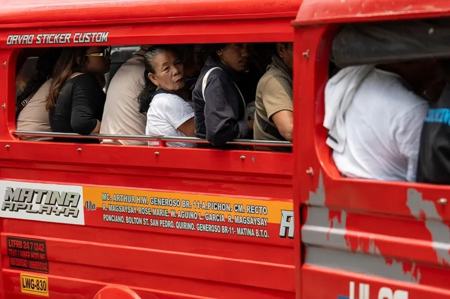 Passengers on a jeepney wait in traffic in Davao City, the Philippines, on 18 September 2026.