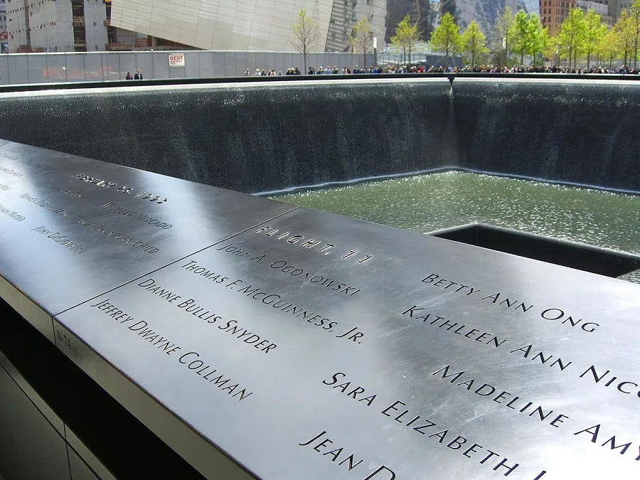 The names of passengers and crew of American Airlines Flight 11 are seen on Panel N-74 of the North Pool of the National September 11 Memorial in Manhattan, as seen on 28 April 2012. Chinese American flight attendant Betty Ann Ong’s name can be seen on the top right. (Luigi Novi/Wikimedia)