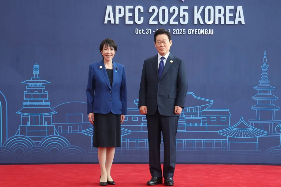 Japanese Prime Minister Sanae Takaichi and South Korea’s President Lee Jae Myung pose for photographs during the Asia-Pacific Economic Cooperation (APEC) summit in Gyeongju, South Korea, 31 October 2025. (Yonhap via Reuters)