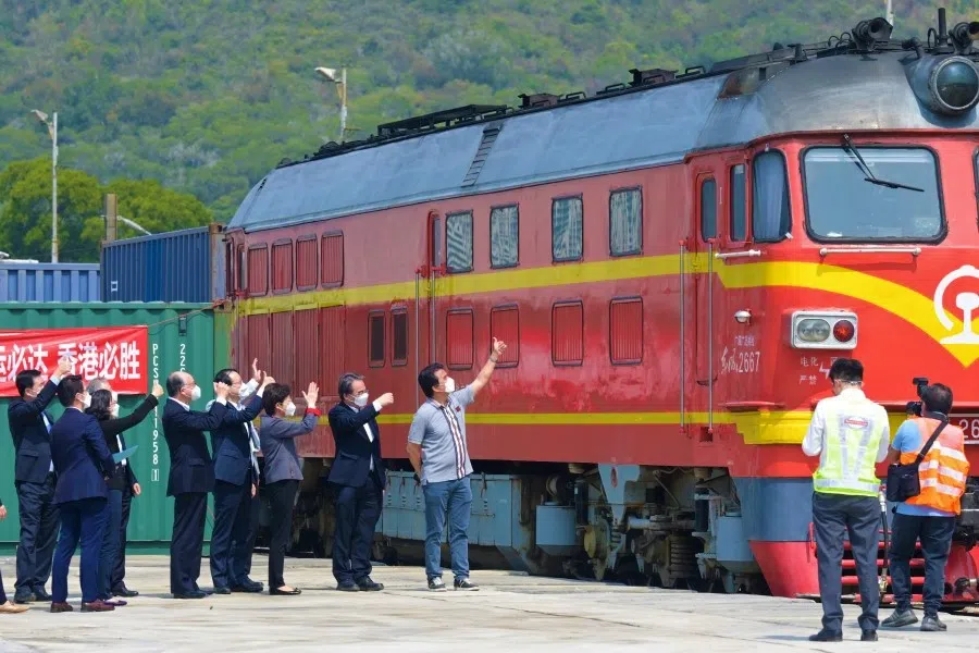Hong Kong Chief Executive Carrie Lam (third from right) at the reopening of the Shenzhen-Hong Kong cargo train route, 2 March 2022. (CNS)