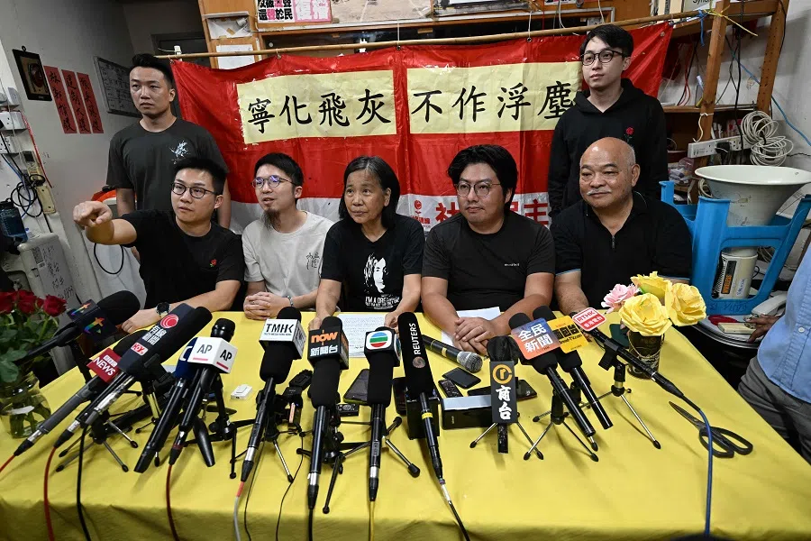 Members of the League of Social Democrats with leader Chan Po-ying (centre) pose for photos ahead of a press conference at their headquarters in Hong Kong on 29 June 2025. (Peter Parks/AFP)
