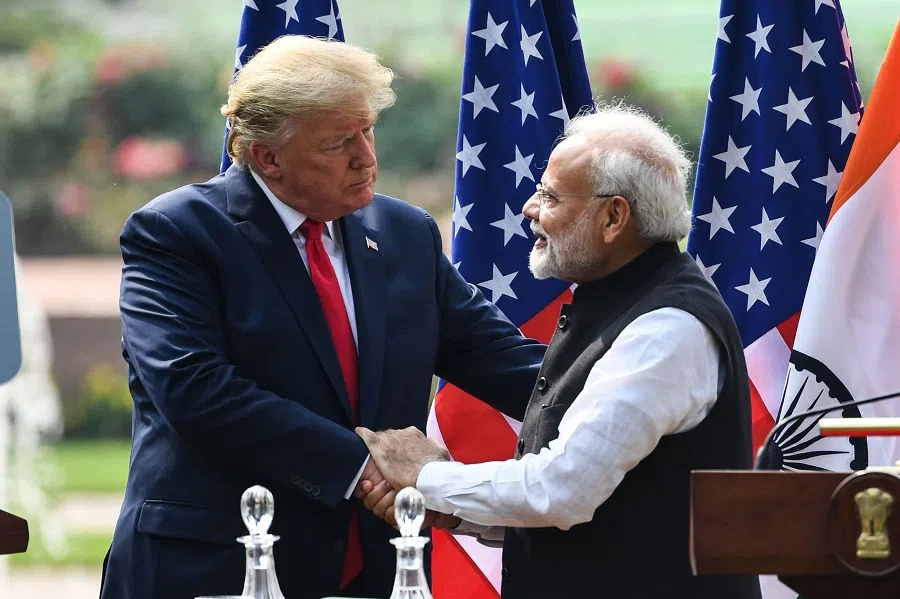 US President Donald Trump (left) shakes hands with India’s Prime Minister Narendra Modi during a joint press conference at Hyderabad House in New Delhi on 25 February 2020. (Prakash Singh/AFP)