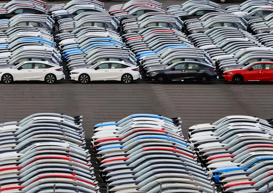 Honda vehicles are lined up at a vehicle storage yard at an industrial port, in Yokohama, near Tokyo, Japan, on 23 July 2025. (Kim Kyung-Hoon/Reuters)