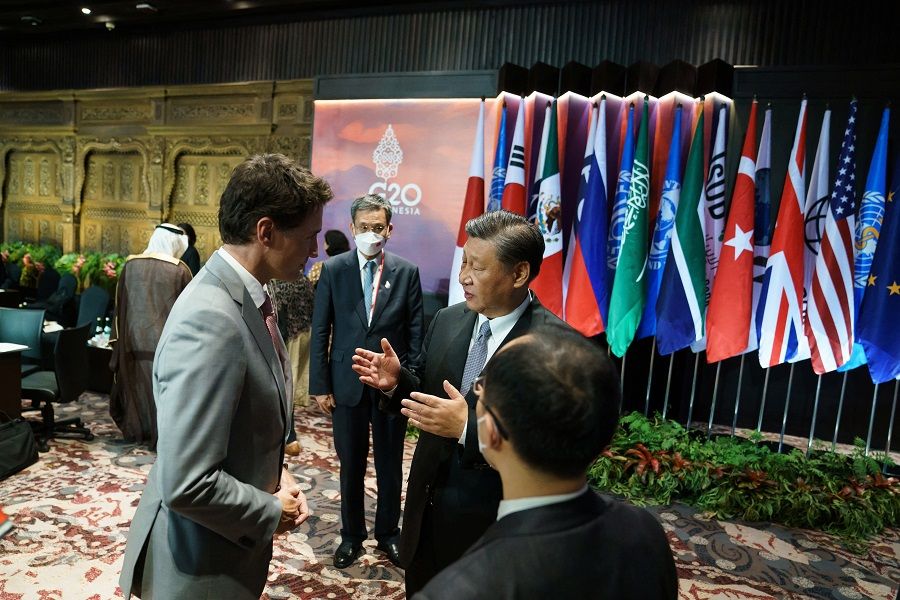 Canada's Prime Minister Justin Trudeau speaks with China's President Xi Jinping at the G20 summit in Bali, Indonesia, 16 November 2022. (Adam Scotti/Prime Minister's Office/Handout via Reuters)
