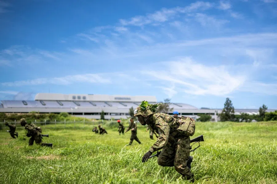 This photo taken on 9 June 2025 shows members of the Japan Ground Self-Defense Force (JGSDF) taking part in an exercise at JGSDF Camp Naha in Okinawa Prefecture. (Philip Fong/AFP)