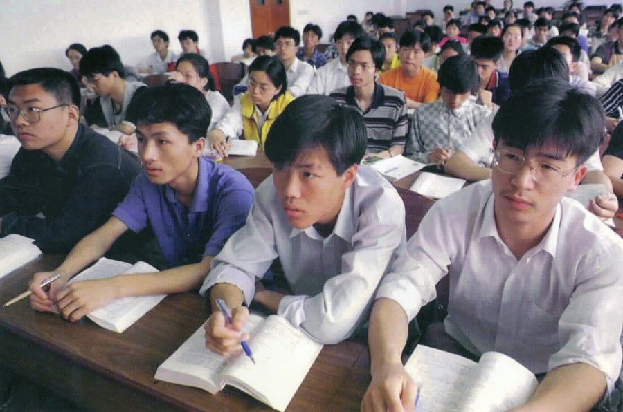 Chinese university students attending classes, circa 2000s. China has a large number of talents in science and mathematics, an important foundation for China's technological development.