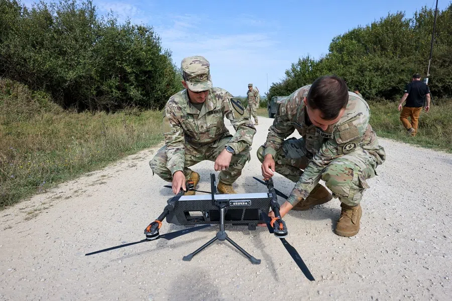 Soliders from the US Army handle a TS-M800 drone during the “Saber Junction 24” US military and North Atlantic Treaty Organization (NATO) training exercise at the US Army’s Hohenfels training Area in Hohenfels, Germany, on 6 September 2024.  (Alex Kraus/Bloomberg)