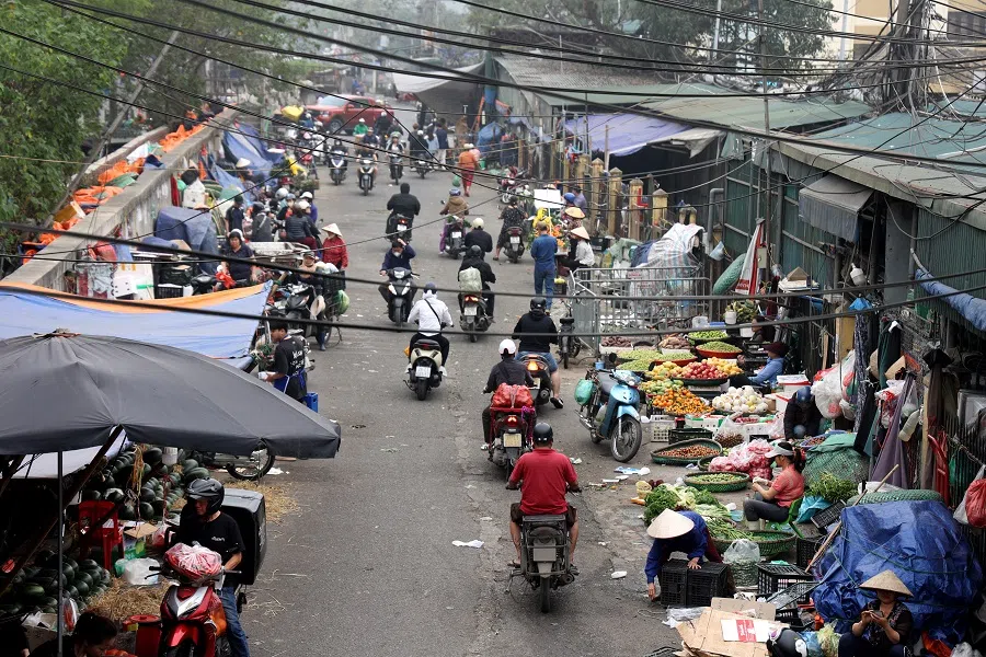 Long Bien bridge and surrounding wholesale market area taken on 25 March 2025.