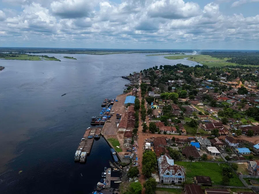 This aerial view shows the ports on the Congo River in Mbandaka, Equateur Province, Democratic Republic of Congo, on 3 October 2025. (Glody Murhabazi/AFP)