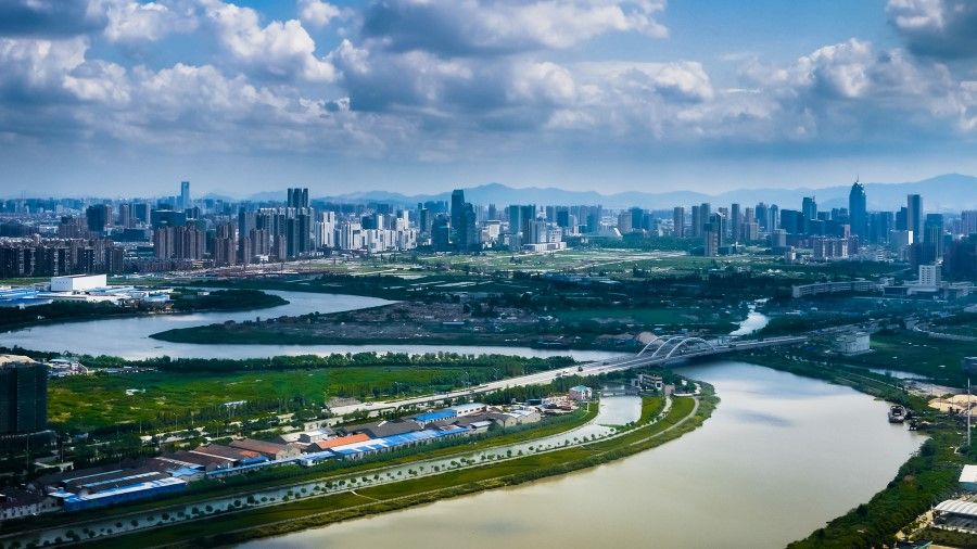 An aerial view of Fenghua River, with the urban and suburban landscape of Ningbo city, Zhejiang Province, China, 2015. (iStock)
