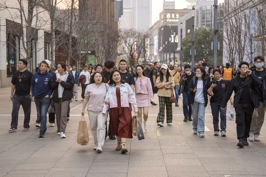 Pedestrians in the Nanjing Road West shopping area in Shanghai, China, on 2 March 2025. (Raul Ariano/Bloomberg)