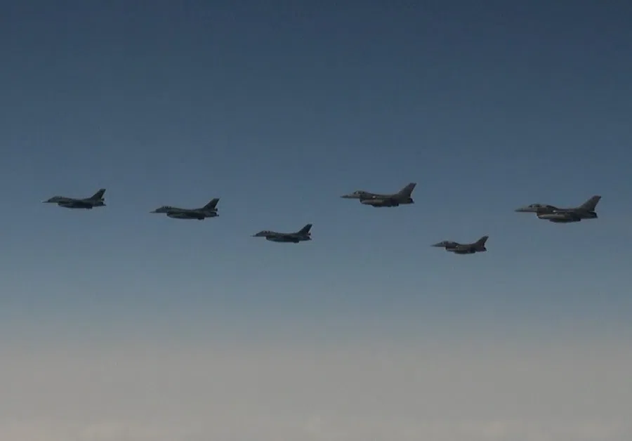 The 7th Air Wing of Japan Air Self-Defense Force's F-2 fighters hold a joint military drill with the US 35th Fighter Wing's F-16 fighters over the Sea of Japan, in this handout picture taken by Japan Air Self-Defence Force and released by the Joint Staff Office of the Defense Ministry of Japan, on 13 April 2023. (Joint Staff Office of the Defense Ministry of Japan/Handout via Reuters)
