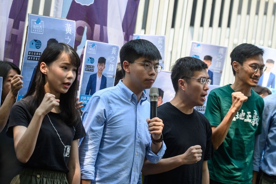 Within a week of returning to Hong Kong from Washington, Wong promptly announced his intention to participate in the upcoming district council elections in November. (Philip Fong / AFP)