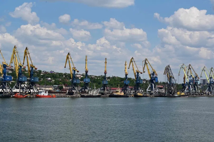 This photograph taken on 12 June 2022 shows cranes at the seaport of Mariupol, amid the ongoing Russian military action in Ukraine. (Yuri Kadobnov/AFP)