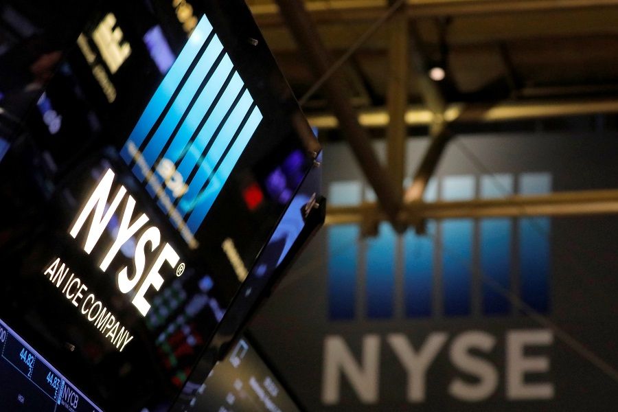 Signage is seen on the trading floor at the New York Stock Exchange (NYSE) in Manhattan, New York City, US, 4 August 2021. (Andrew Kelly/Reuters)