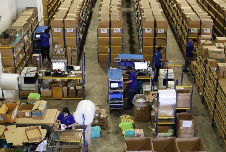 A scene at logistics company IM Holdings Pte Ltd, 14 August 2020. Digitalisation efforts have brought business benefits to logistics SMEs that provide warehouse and inventory management services