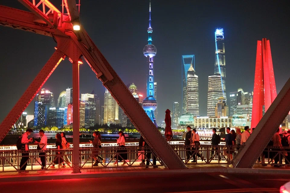 A crowd seen at the Bund, Shanghai at night, 28 April 2023. (SPH Media)