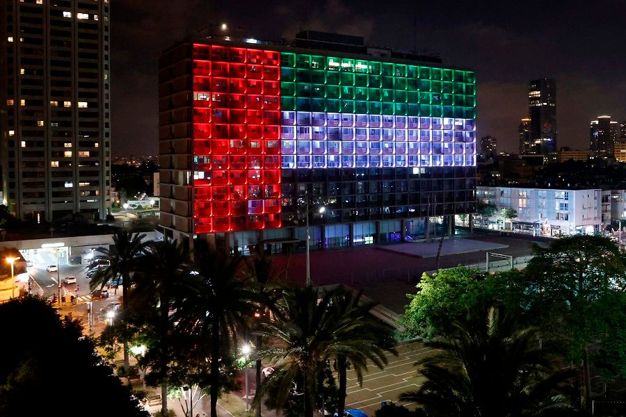 The city hall in the Israeli coastal city of Tel Aviv is lit up in the colours of the United Arab Emirates national flag on 13 August 2020. (Jack Guez/AFP)