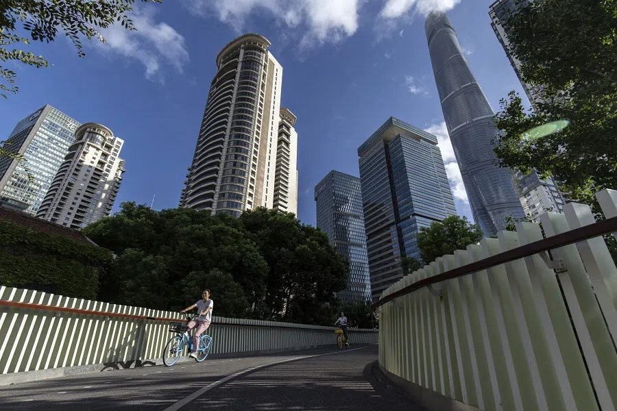 Cyclists in Shanghai, China, on 13 September 2024. (Qilai Shen/Bloomberg)