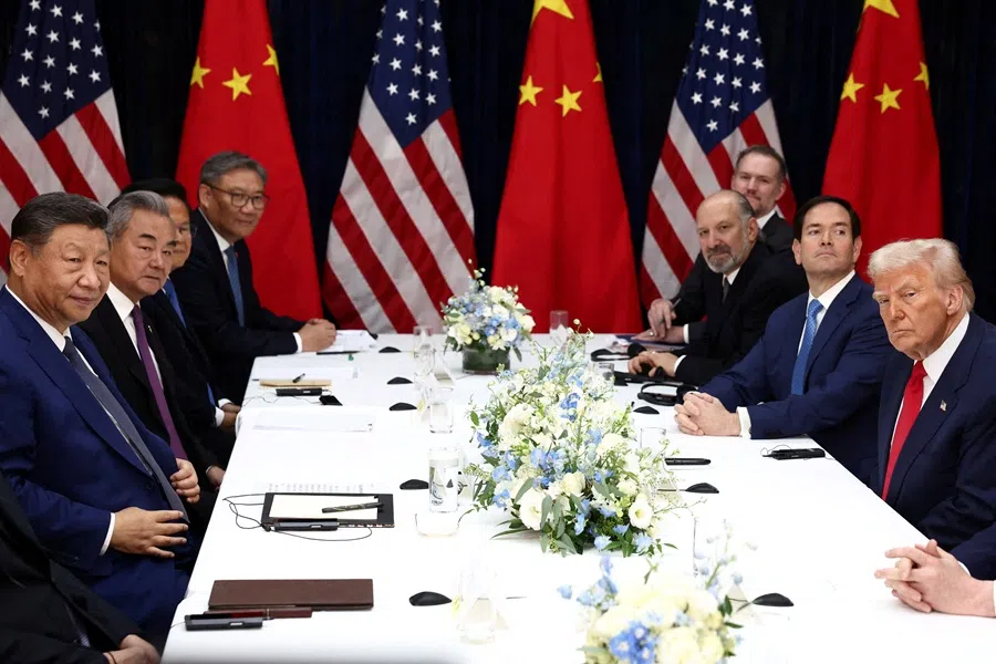 US President Donald Trump, accompanied by US Secretary of State Marco Rubio and US Secretary of Commerce Howard Lutnick, attends a bilateral meeting with Chinese President Xi Jinping, accompanied by Chinese Foreign Minister Wang Yi, at Gimhae International Airport, on the sidelines of the Asia-Pacific Economic Cooperation (APEC) summit, in Busan, South Korea, 30 October 2025. (Evelyn Hockstein/Reuters)