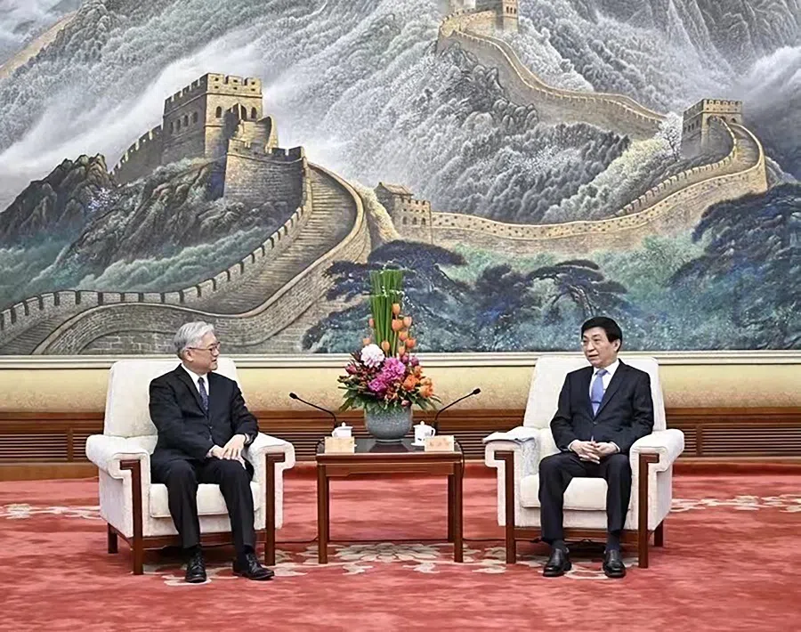 KMT vice-chairman Andrew Hsia (left) meeting Mr Wang Huning, the Communist Party's fourth-ranked member and its chief political strategist, in Beijing, China. (Photo courtesy of the Kuomintang)