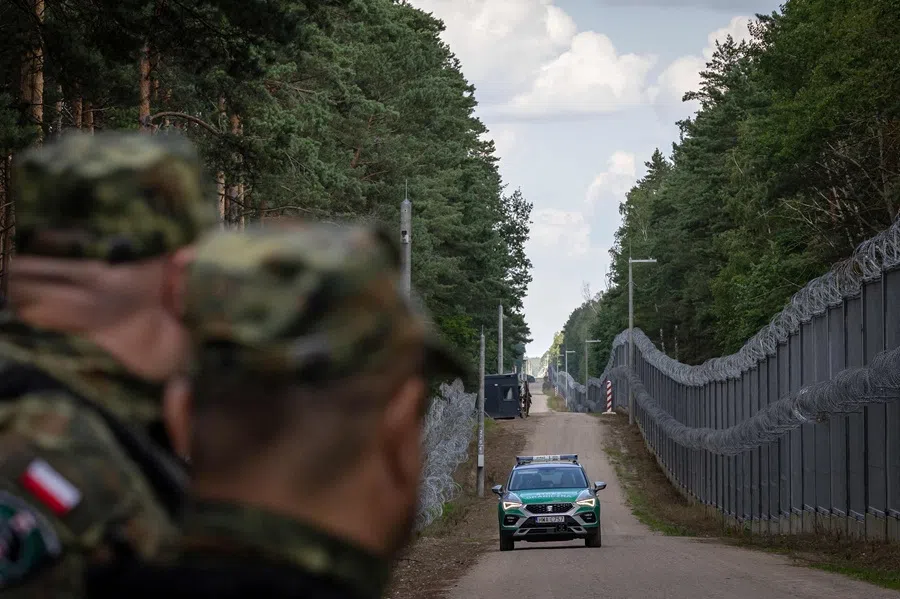 A border guard vehicle drives along the border fence at the Polish-Belarusian border in Polowce-Pieszczatka, Poland, on 21 July 2025. (Wojtek Radwanski/AFP)