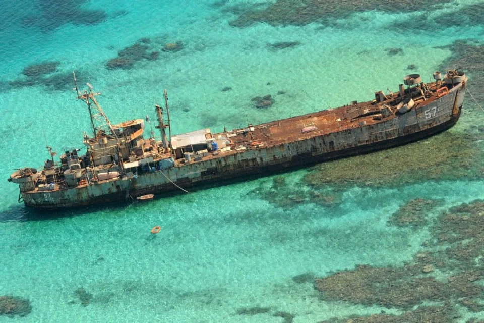 This file photo taken on 29 March 2014 shows a Philippine Navy vessel that has been grounded since 1999 to assert the nation's sovereignty over the Second Thomas Shoal, a remote South China Sea reef also claimed by China. (Jay Directo/AFP)