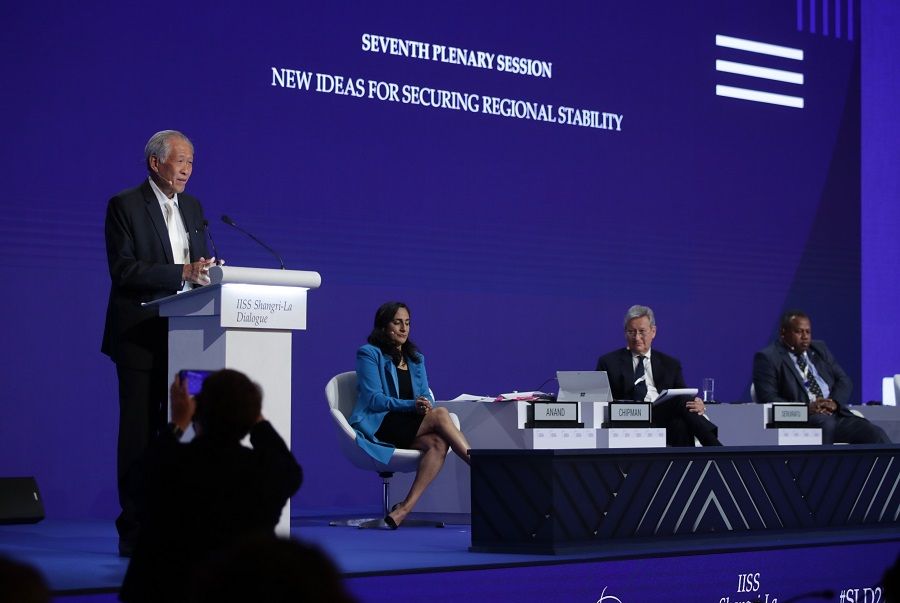 Singapore's Defence Minister Ng Eng Hen speaking at the seventh plenary session of the SLD on 12 June 2022 in Singapore. With him are, (left to right): Anita Anand, Minister of National Defence, Canada; John Chipman, Director-General and Chief Executive, IISS; and Inia Batikoto Seruiratu, Minister for Defence, National Security and Policing, Fiji. (SPH Media)