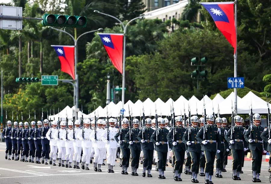 The Ministry of National Defense Honor Guard perform during National Day celebrations in front of the Presidential Palace in Taipei, Taiwan, on 10 October 2026.