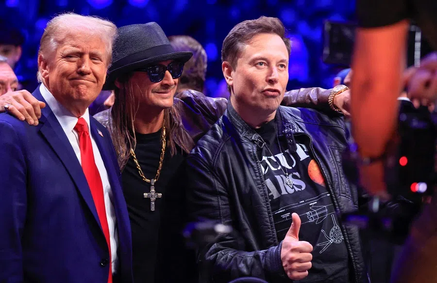 US President-elect Donald Trump, singer Kid Rock and Tesla and SpaceX CEO Elon Musk pose for a photo as they attend UFC 309 at Madison Square Garden in New York, on 16 November 2024. (Kena Betancur/AFP)