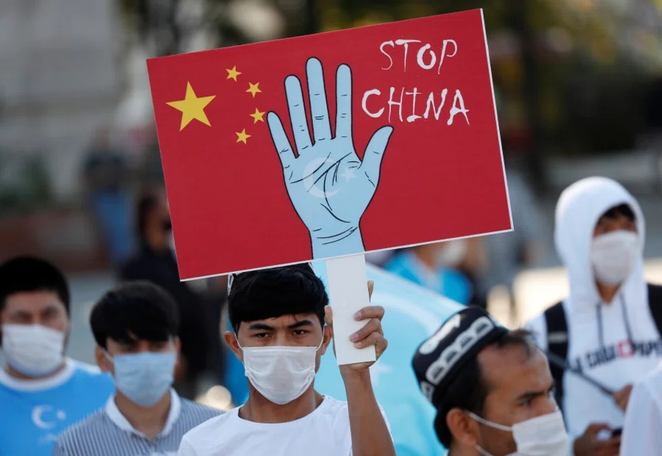 Ethnic Uighur demonstrators take part in a protest against China and its treatment of Uighurs in Xinjiang, in Istanbul, Turkey, 1 October 2020. (Murad Sezer/REUTERS)