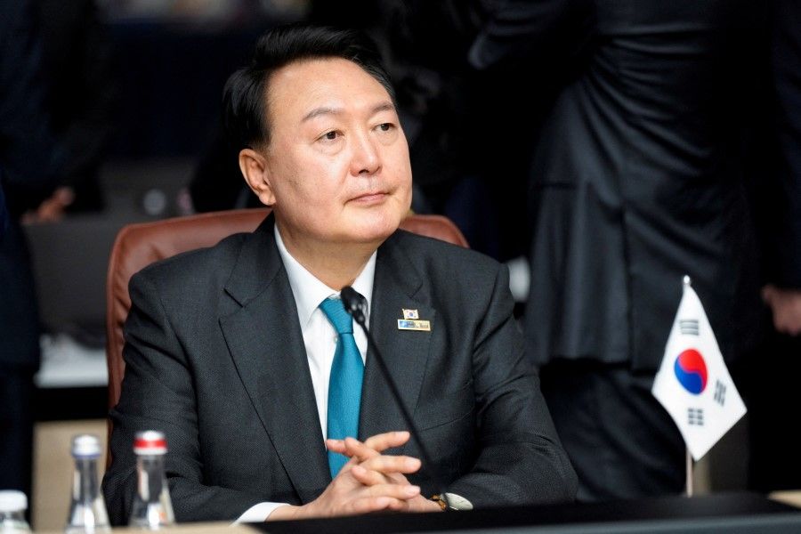 Yoon Suk-yeol, President of South Korea, attends a meeting of the North Atlantic Council during a NATO leaders summit in Vilnius, Lithuania, on 12 July 2023. (Ints Kalnins/Reuters)