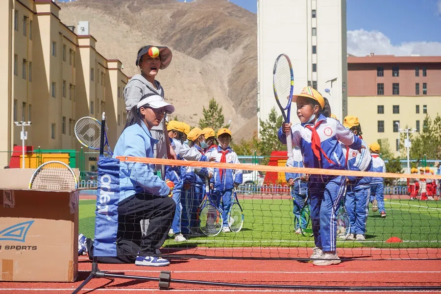 Primary school students learn to play tennis in school, in Tibet, China, on 13 May 2022. (CNS)