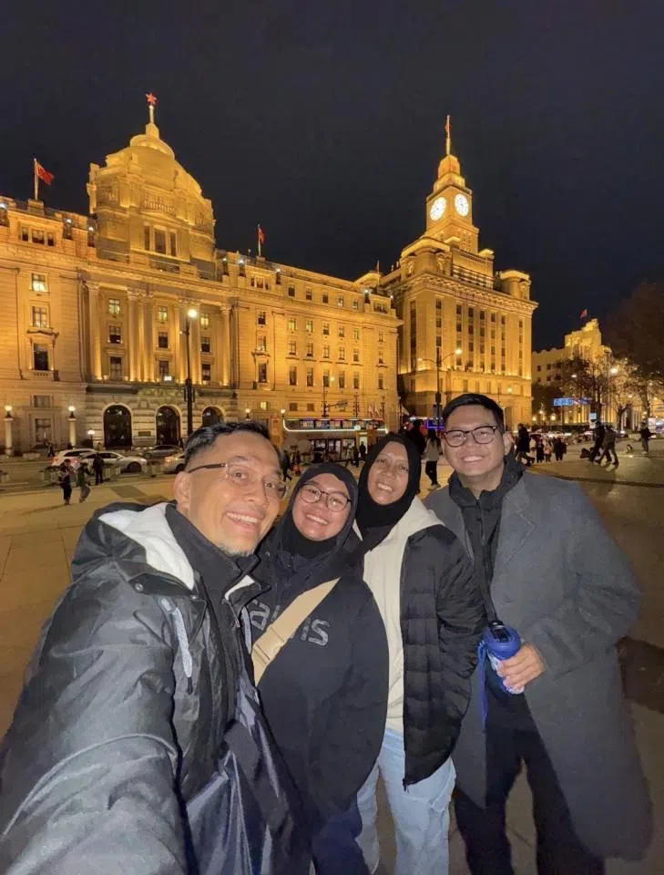 Rifqi with his family at the Bund in Shanghai. (Photo provided by interviewee)