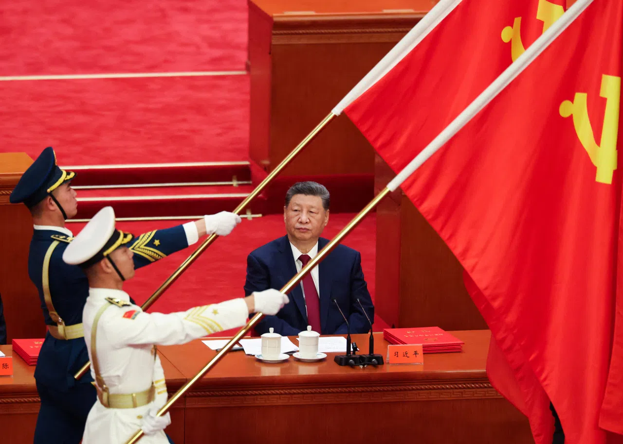 Chinese President Xi Jinping looks on as the People’s Liberation Army honour guard hold party flags during a ceremony marking the 105th anniversary of the founding of the Communist Party of China at the Great Hall of the People in Beijing, China, on 1 July 2026.