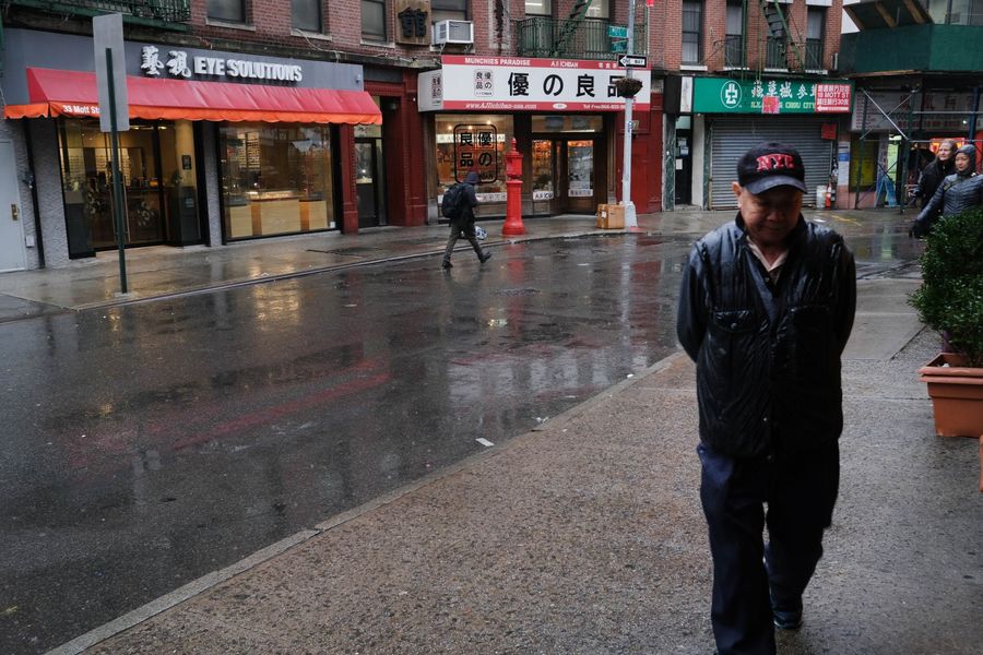 People walk through an empty New York City Chinatown on 13 February 2020. (Spencer Platt/Getty Images/AFP)