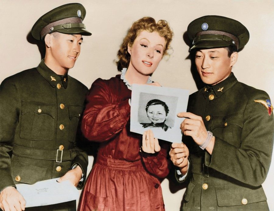 Pilots Dong Shiliang and Ma Yu, in the US for training, get an autograph from movie star Greer Garson - on the back of a photo of Madame Chiang on her US visit, 1944. The two young pilots had only been in the US for a few weeks, and their training base was near Hollywood. Dong Shiliang was the son of Dong Xianguang (Hollington Tong), the Deputy Minister of Propaganda, who was part of Madame Chiang's entourage on one of her previous US visits. Garson won a Best Actress Oscar in 1942, for her role as a strong British wife and mother in the middle of World War II in the movie Mrs Miniver.
