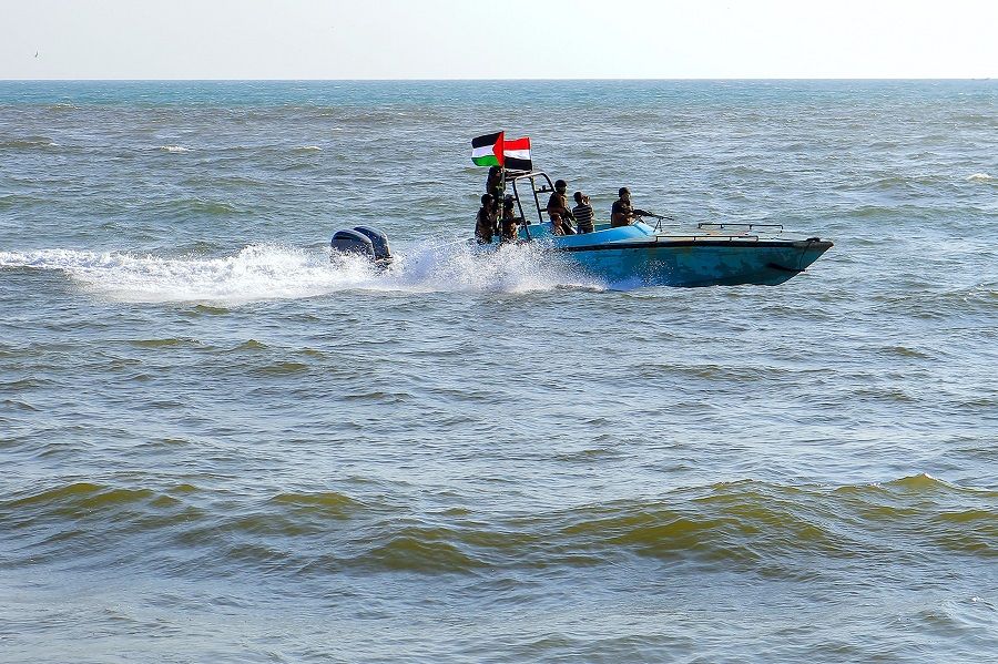 Members of the Yemeni Coast Guard affiliated with the Houthi group patrol the sea as demonstrators march through the Red Sea port city of Hodeida in solidarity with the people of Gaza on 4 January 2024, amid the ongoing battles between Israel and Hamas. (AFP)