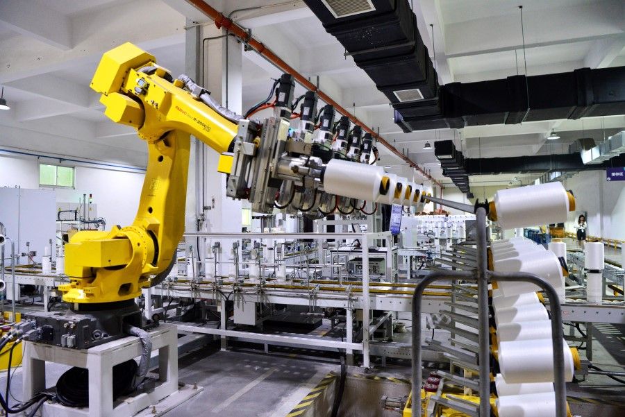 A robotic arm at work in a smart vehicle factory in Fuzhou, Fujian province, 31 May 2023. (CNS)