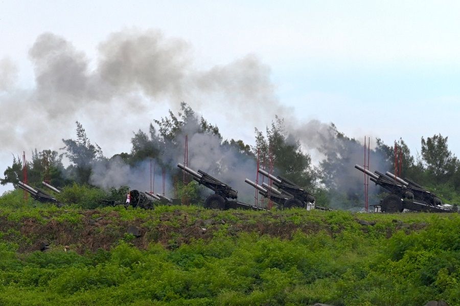Taiwan military soldiers fire 155mm howitzers during a live fire anti-landing drill in Pingtung,Taiwan on 9 August 2022. (Sam Yeh/AFP)