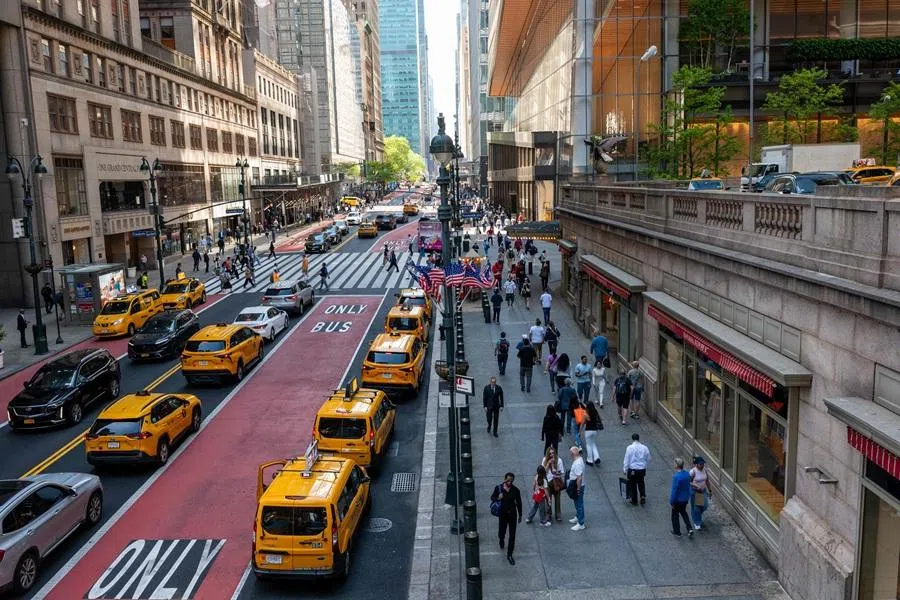 People walk through Manhattan on 5 May 2026, in New York City. (Spencer Platt/Getty Images/AFP)