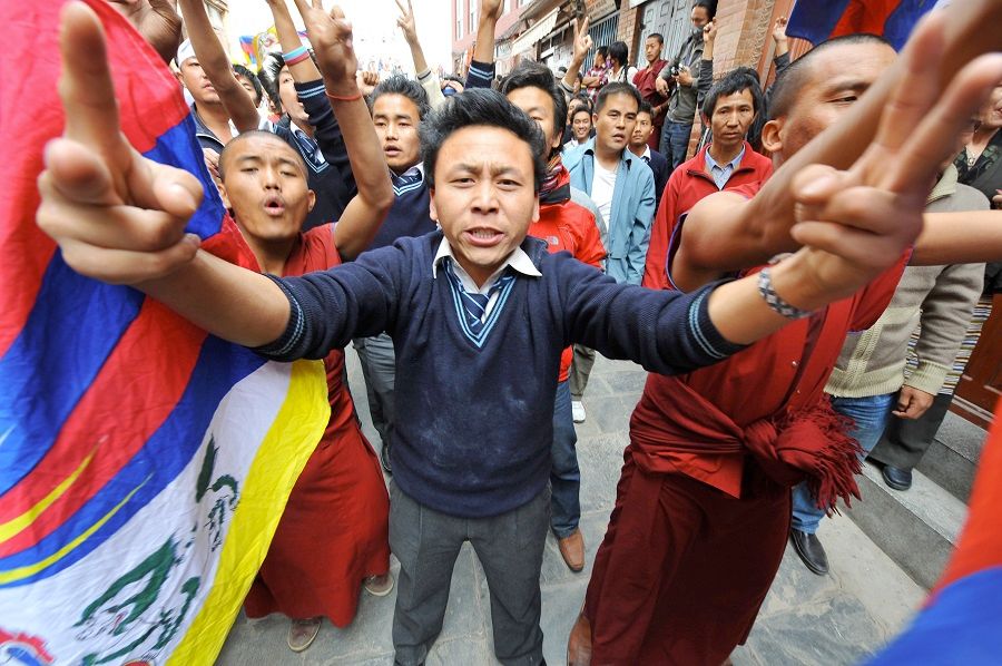 Tibetans protesting on the streets of Nepal's capital, Kathmandu on 10 March 2009. They were marking the 50th anniversary of a failed uprising against China, which led to Dalai Lama, the Tibetan spiritual leader, fleeing into exile. (Photo: Chong Jun Liang)
